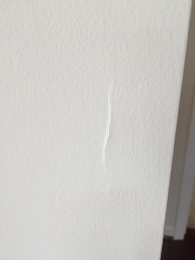 crack in drywall from shifting walls in home