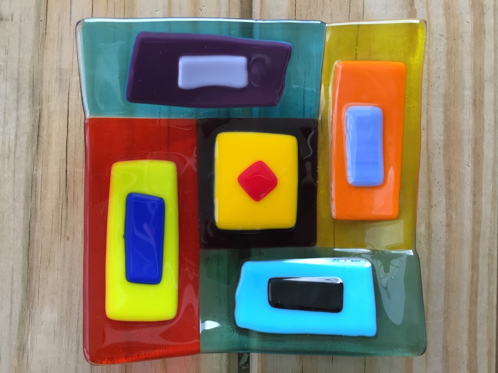 colorful fused glass piece of geometric design
