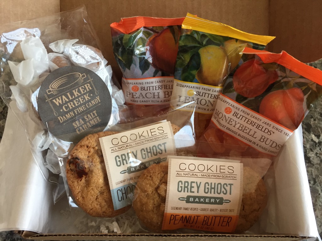 treatsie august 2015 box contents with walker creek caramels, butterfields candy buds, and grey ghost bakery cookies