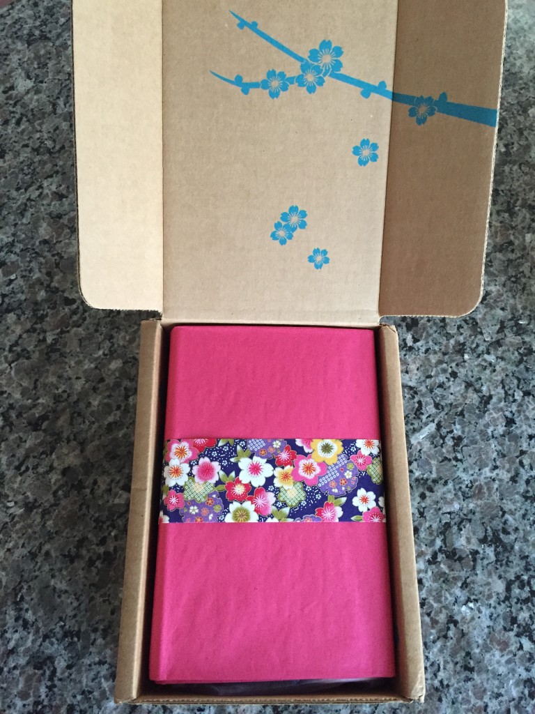 yuzen august-october 2015 autumn box open with fuchsia tissue paper and piece of yuzen paper