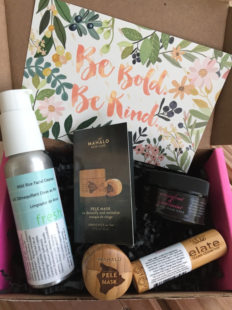contents of petit vour september 2015 box with blissoma facial cleanser, mahalo mask, msc sugar scrub, elate lipstick, and info card with be bold be kind theme