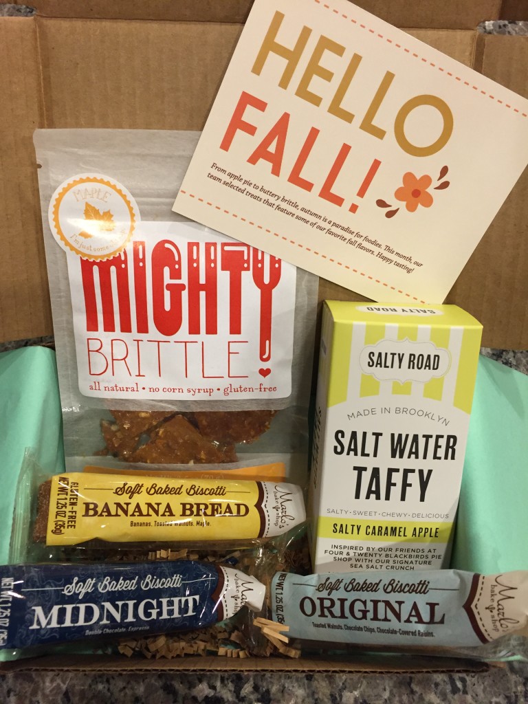 treatsie september 2015 box contents with mighty brittle, salty road taffy, and marlo's bake shop biscotti