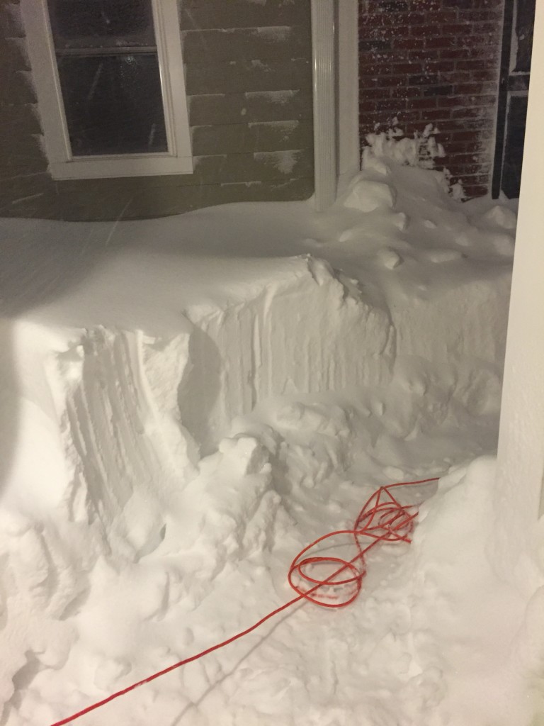 partially-shoveled snow accumulation of blizzard 2016