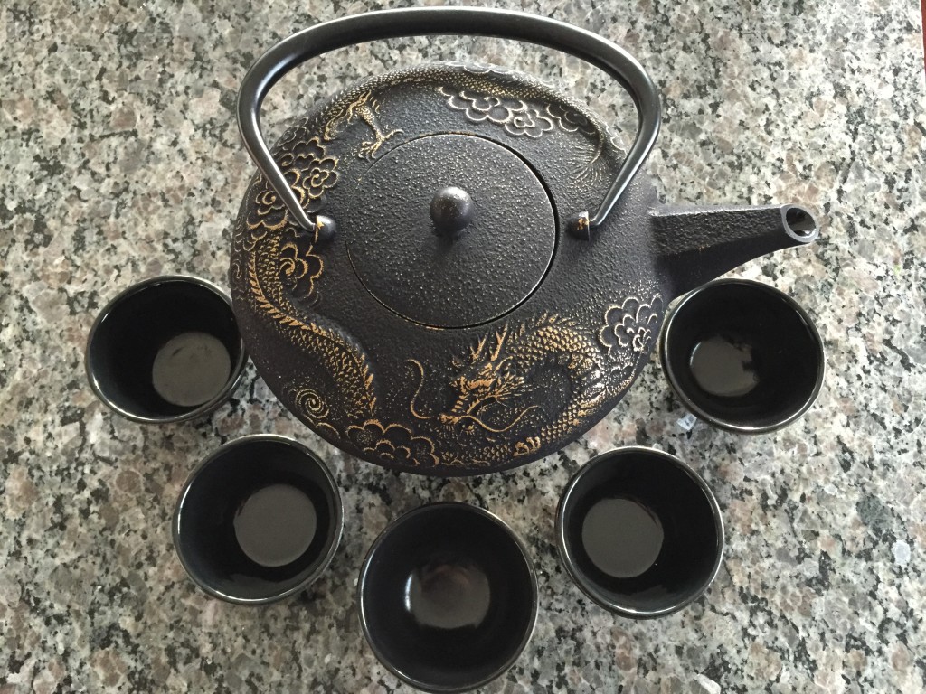 teavana imperial dragon cast iron tea set with teapot, cups, and hidden warmer