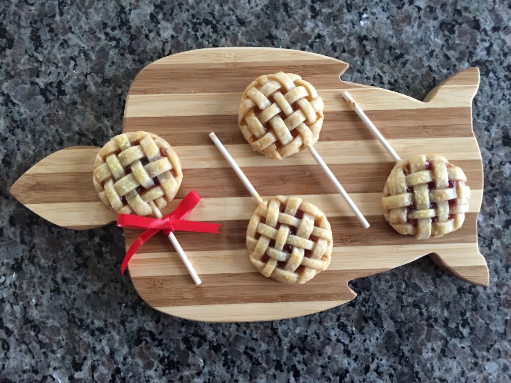 finished pie pops laid out on turtle-shaped cutting board