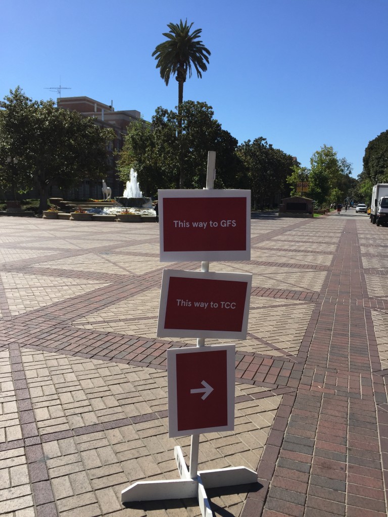 sign post guiding attendees to breakout rooms for usc own it 2016 conference