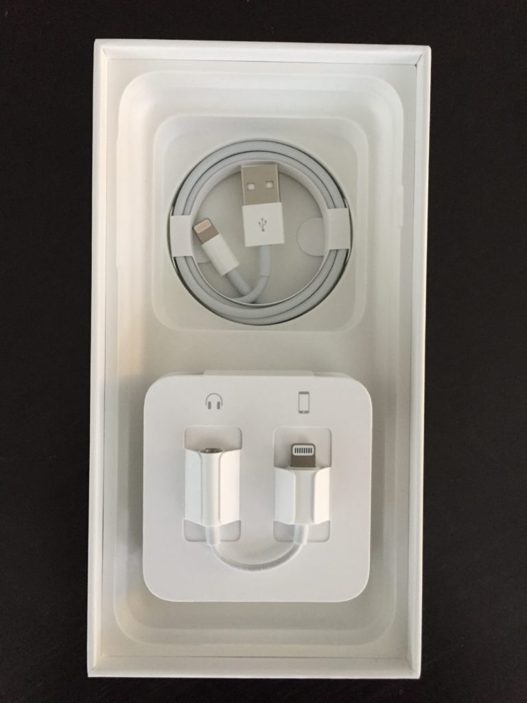 iphone 7 plus charging cable and headphone jack converter in box