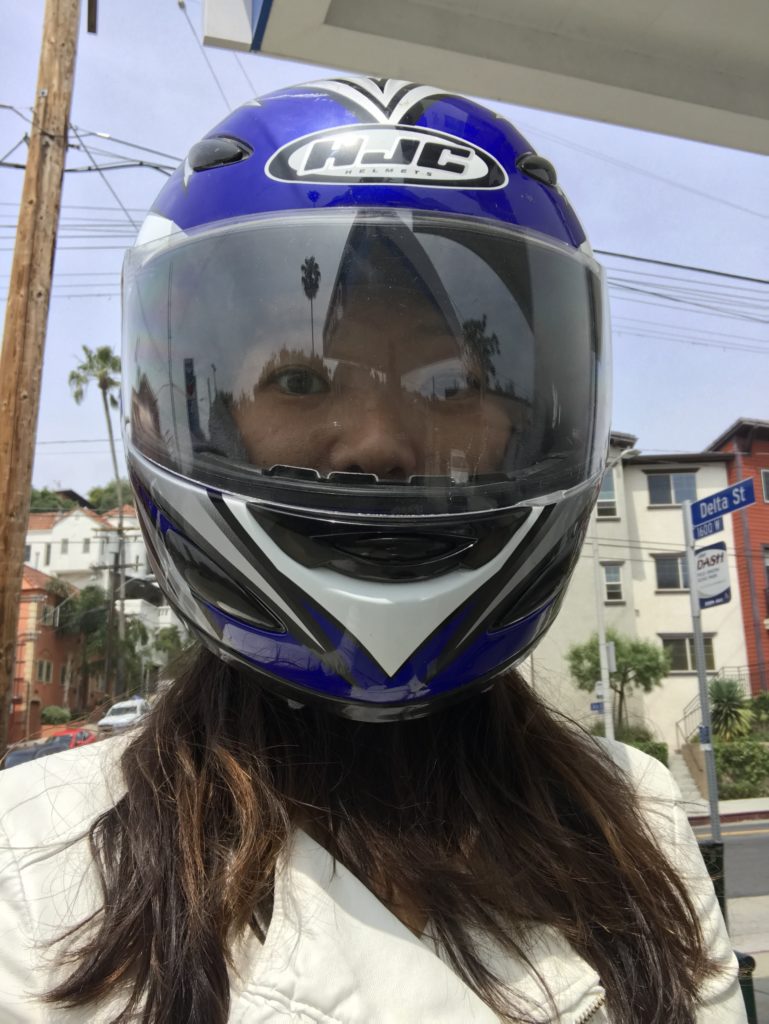 selfie with blue motorcycle helmet on