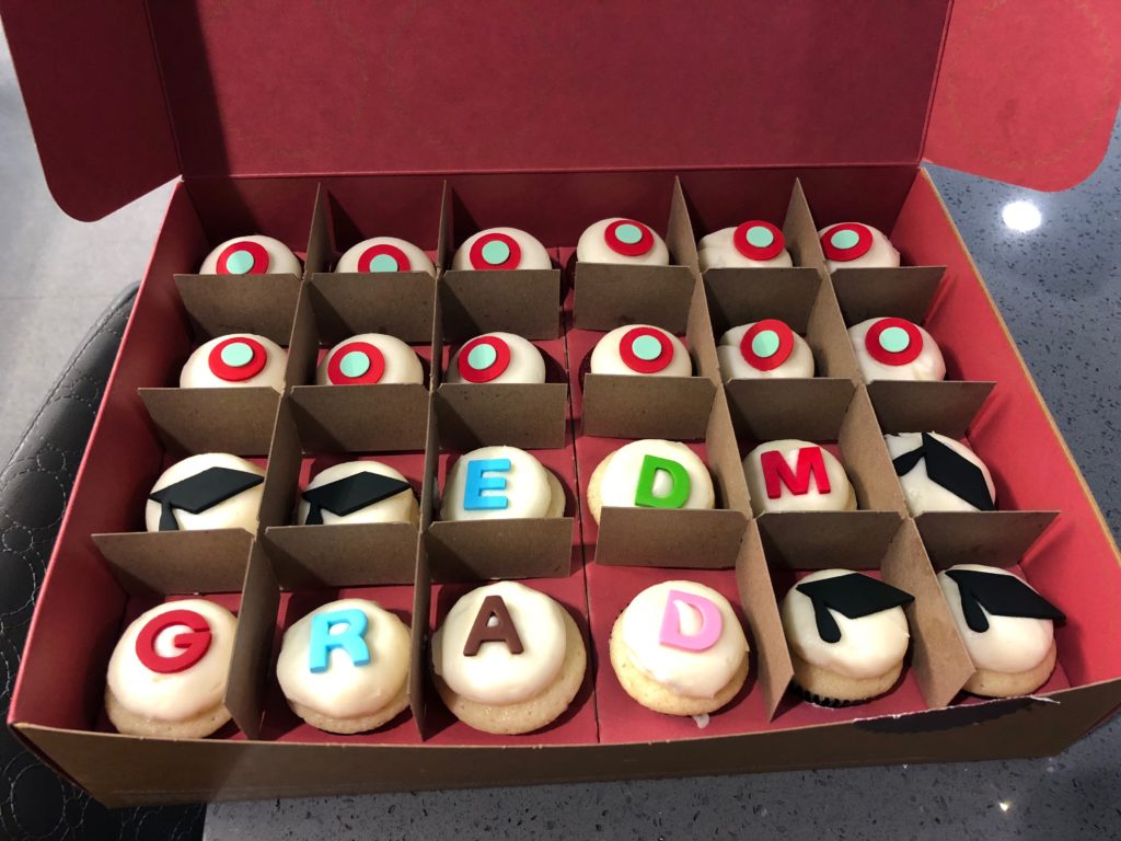 sprinkles mini cupcakes with graduation messaging