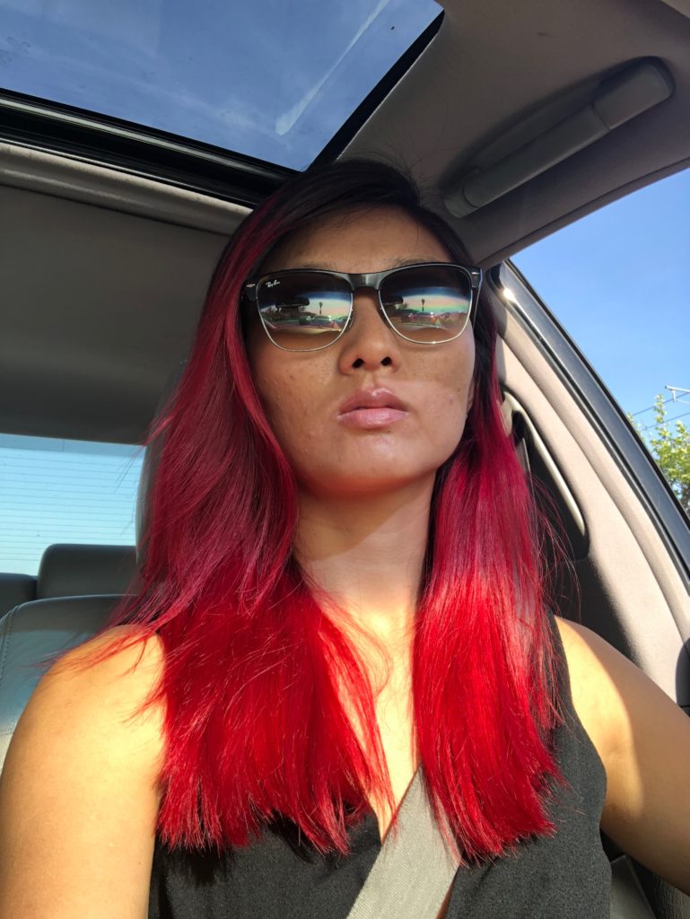 bright red hair car selfie